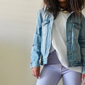 Distressed denim jacket by Forever 21